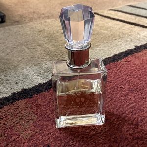 Peace love and juicy couture perfume. A little over half a bottle.